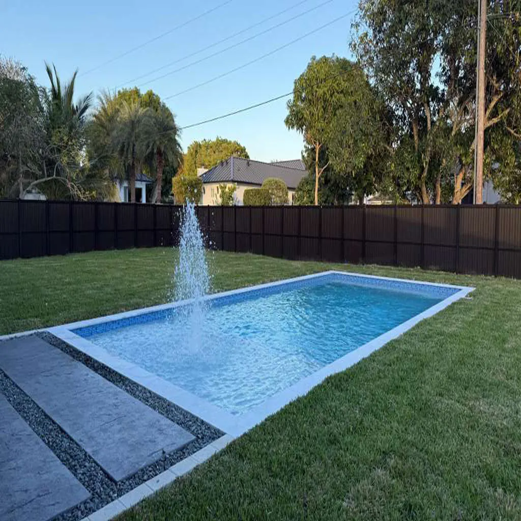 Garden lap pool with a fountain