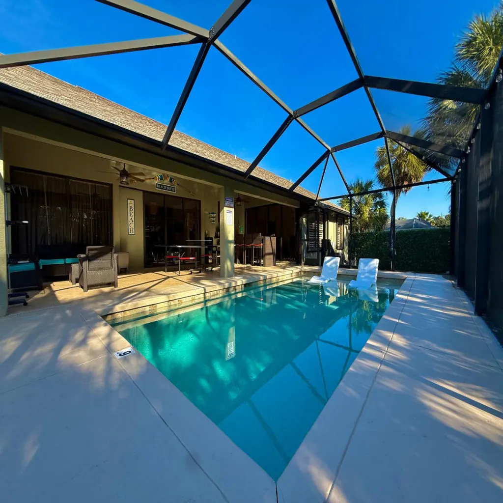 Pool inside a screened enclosure