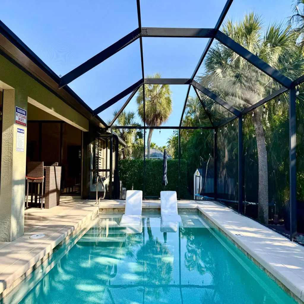 Custom pool under a screened lanai