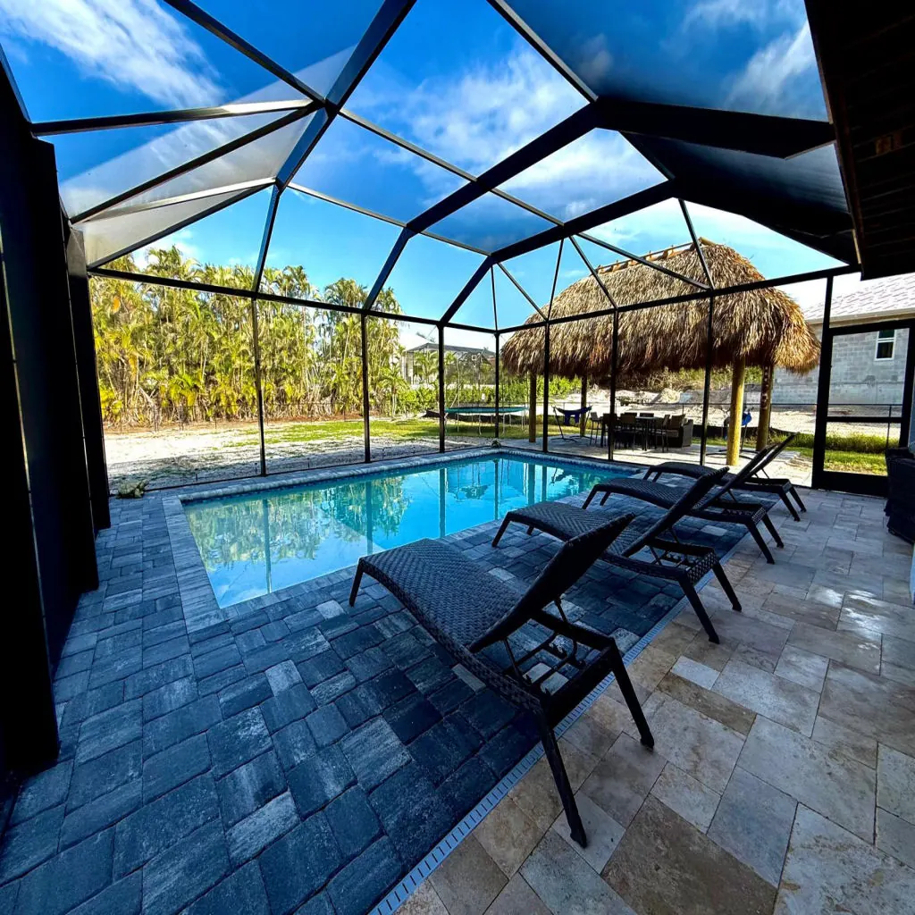 Pool with a tiki hut providing shade