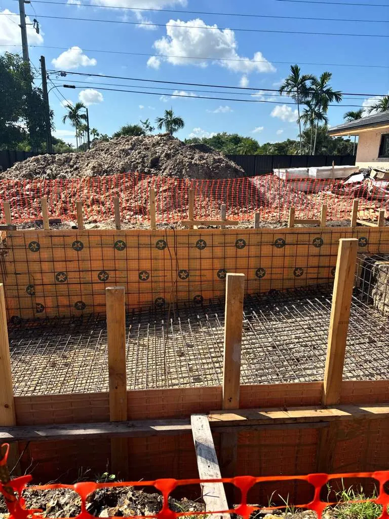 Steel reinforcement set in a pool excavation